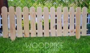 Praktyczny przewodnik: jak skutecznie zamontować płotek drewniany w ogrodzie